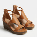 Bella Rue Official black wedge sandal hero tan cognac