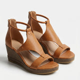Bella Rue Official black wedge sandal hero tan cognac