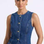 Close-up detail of Luna Indigo co-ord gold button-up front, functional pockets, and structured stitching